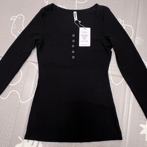 Sleek Black Long Sleeve Bodysuit